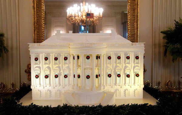 one of the more impressive items is a giant gingerbread white house here it is on display in the state dining room 1512361852 811 width600height379